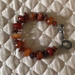 Handmade bracelet of vibrant quartz stones.